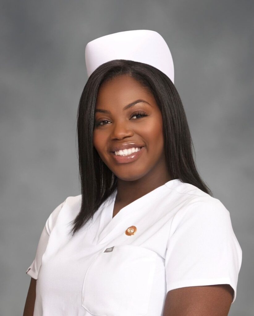 Woman wearing a nursing uniform and hat