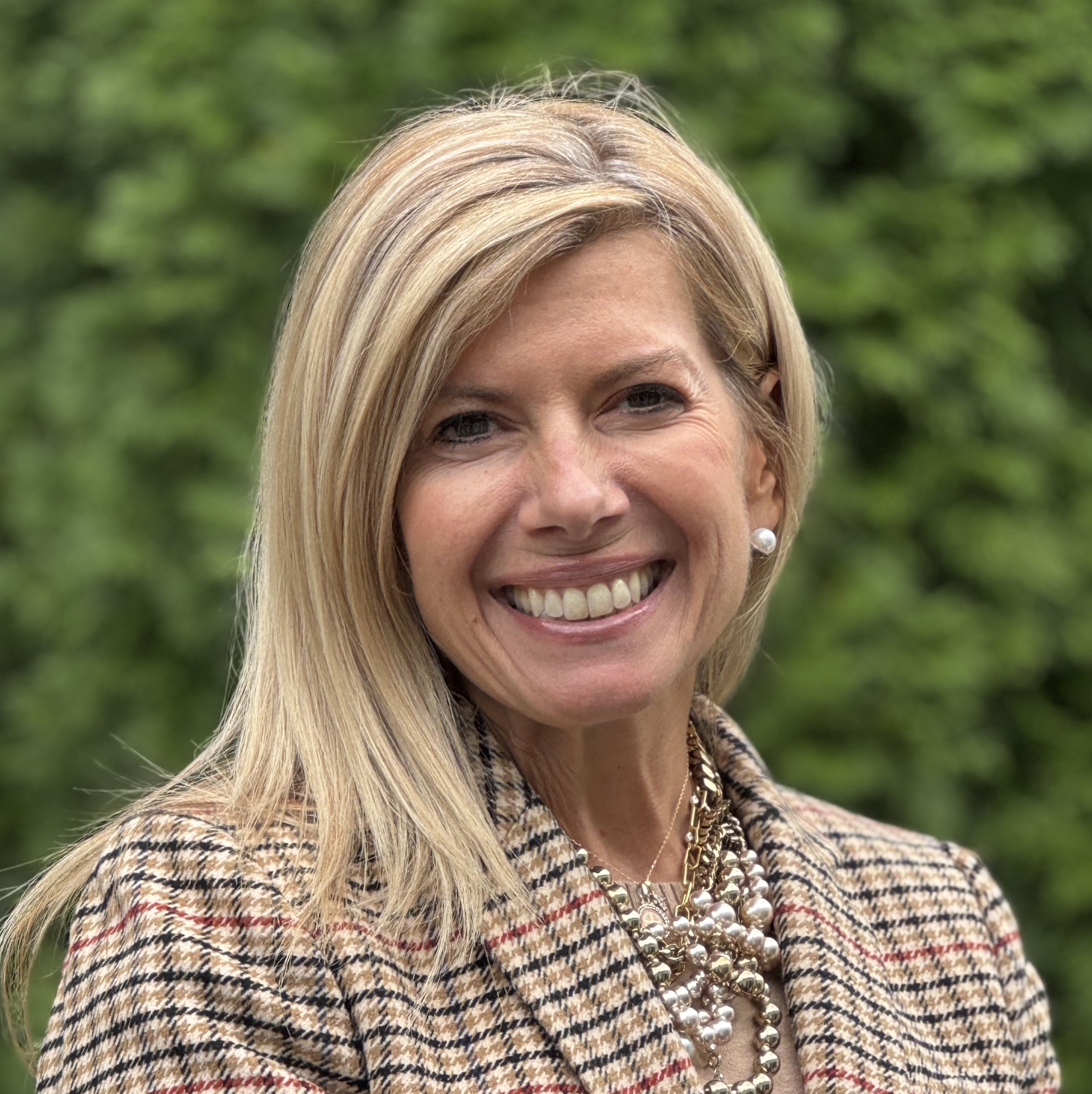 smiling woman with long blond hair