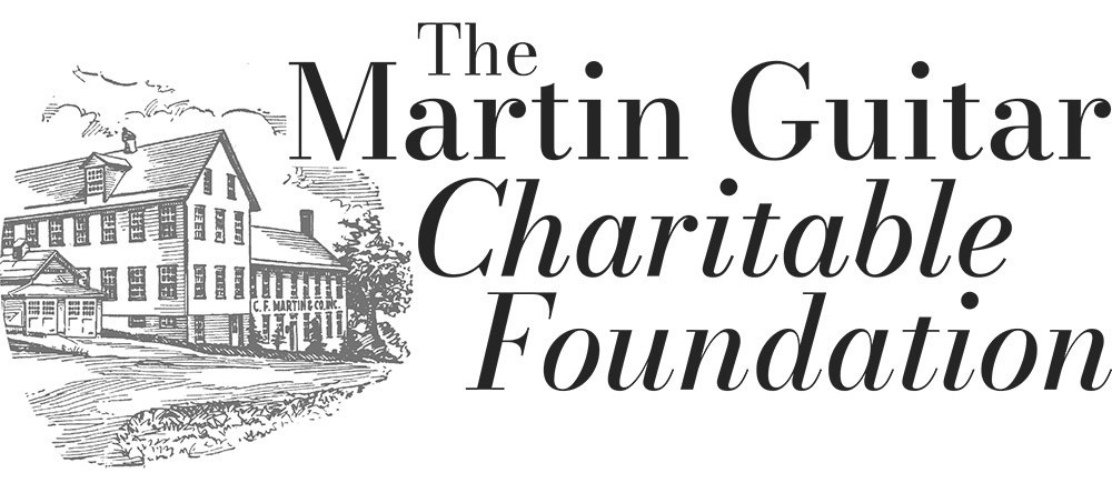 The Martin Guitar Charitable Foundation, a woodcut image of a house with the words of the foundation next to it